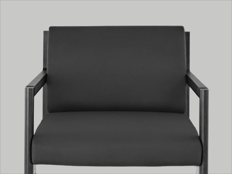 Black-and-white image of the seat and back of a Brabo club chair, viewed from the front.