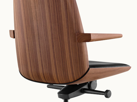 The veneer back of a Clamshell conference chair, viewed from behind at an angle. Select to go to the Conference Chairs landing page.