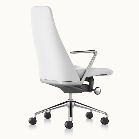 A Taper executive chair with white leather upholstery, viewed from behind at an angle. Select to go to the Office Chairs landing page.
