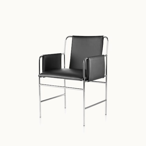 Angled view of an Envelope side chair with black leather upholstery and a tubular steel frame. Select to go to the Envelope Chair product page.