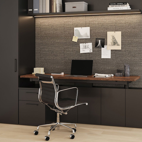 Geiger One Private Office in Black TFL and Solid Walnut desk with Eames Aluminum Group Chair.