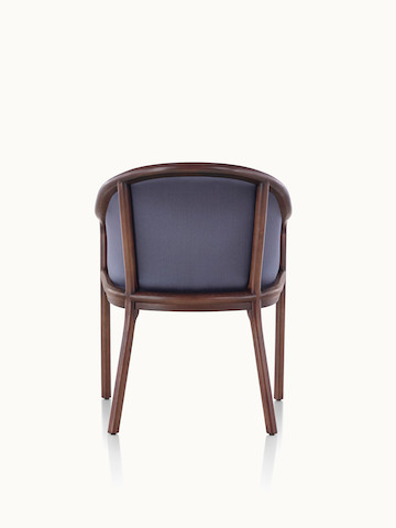 A Landmark side chair with dark blue French upholstery and a dark wood frame, viewed from behind.