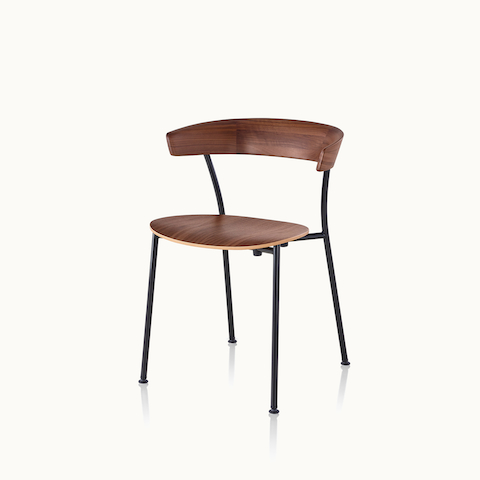 Angled view of a Leeway side chair with a metal frame and a wood backrest and seat in a medium finish. Select to go to the Leeway Chair product page.