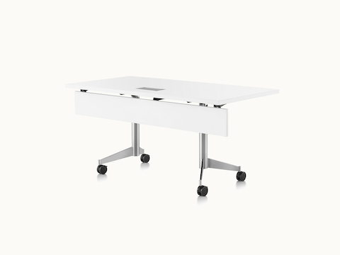 A rectangular MP Flex Table with a white laminate top and silver base, viewed at an angle.
