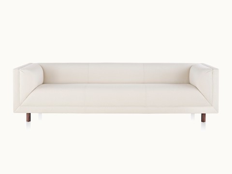 An off-white sofa from the Rolled Arm Sofa Group, viewed from the front.