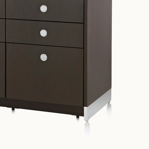 Angled view of a Sled Base Storage unit with a dark wood finish, showing the chrome base.