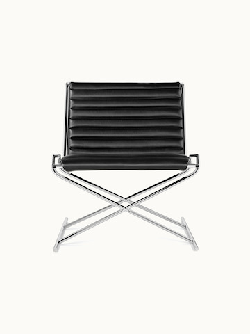 A Sled lounge chair with ribbed black leather upholstery and an X-shaped steel frame, viewed from the front.