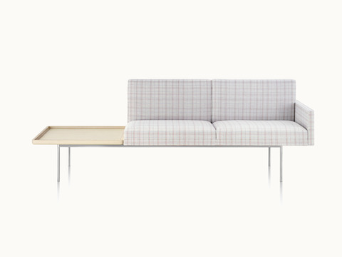 A non-quilted Tuxedo Component settee with plaid upholstery and an attached table, viewed from the front.